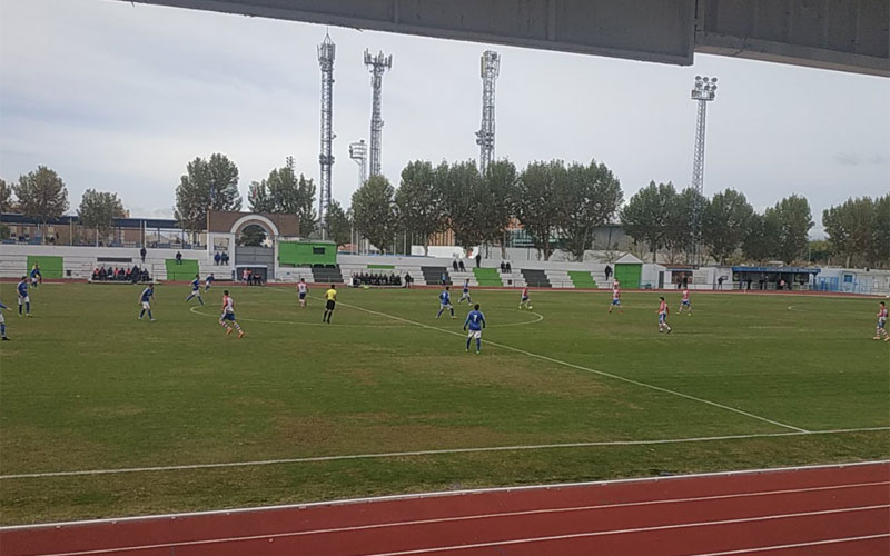 Jugadores del maracena y torredonjimeno durante el partido