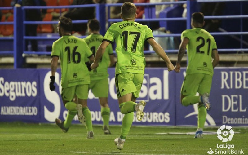 José Corpas celebra un gol con sus compañeros de la UD Almería